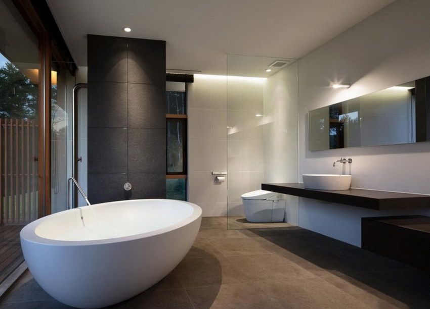 Три вида крупноформатной плитки интегрированы в интерьер туалетной комнаты в японском стиле