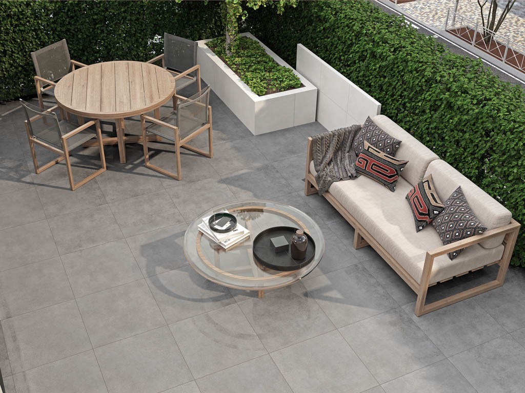 Бетонные копии керамогранита выступают нейтральным фоном в контексте разных стилей и гармонируют с текстурами камня, дерева, металла